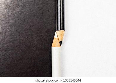 White and black pencils. Contrast and opposite concept - Shutterstock ID 1385145344