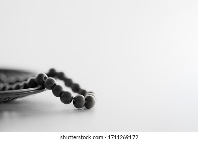 White And Black Photography Of Rosary For Religious Uses And Worship.