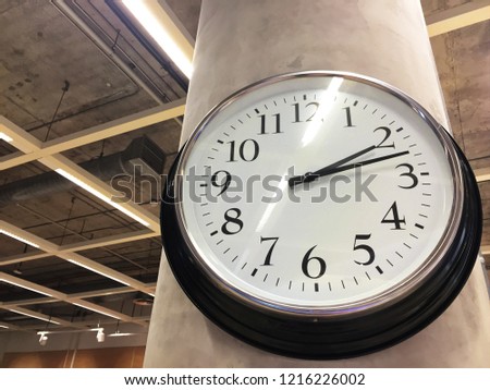 White Black Round Clock On Pole Stock Photo Edit Now 1216226002