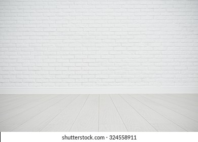 White Blank Brick Wall And Wooden Floor In An Empty Room