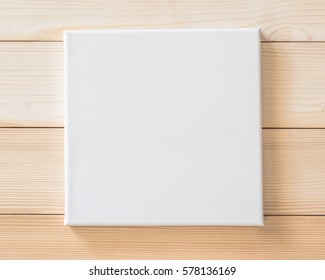 White Blank Canvas Frame Mockup Square Size On White Wood Wall For Arts Painting And Photo Hanging Interior Decoration