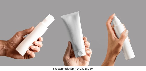 White blank cream tube, spray lotion bottle, cosmetic pack mockups in male hands set isolated on white background