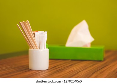 white blank packaging sticks holder on wooden background for graphic designer and mock up. Branding Logo Template for restaurant sugar, salt, tissue box, stirring sticks coffee and tea and drinks
