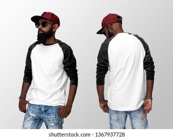 White Blank Raglan T-shirt On A Young African American Man In Jeans, Isolated On A White Studio Background, Front And Back View Mockup Of White Long Sleeve Shirt With Place For Your Logo Or Design