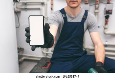 White Blank Screen Mobile Phone In Plumber's Hand In Protection Gloves