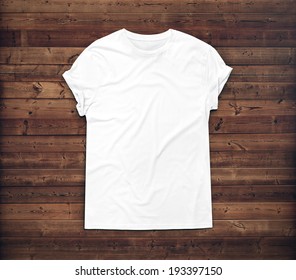 White Blank T-shirt On Dark Wood Desk