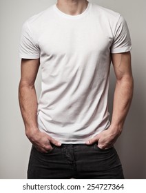 White Blank T-shirt On Young Athletic Man, Front