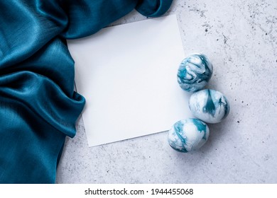 White And Blue Handprinted Easter Eggs Folded In Blue Silky Scarf With Greeting Card