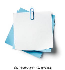 White And Blue Note Papers With Paperclip On White Background