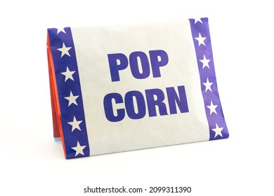 White And Blue Paper Packaging Popcorn With Corn Kernels For Microwave Isolated On White Background