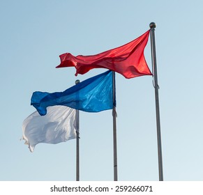 White Blue Red Flags Against Sky Stock Photo 259266071 Shutterstock   White Blue Red Flags Against 260nw 259266071 