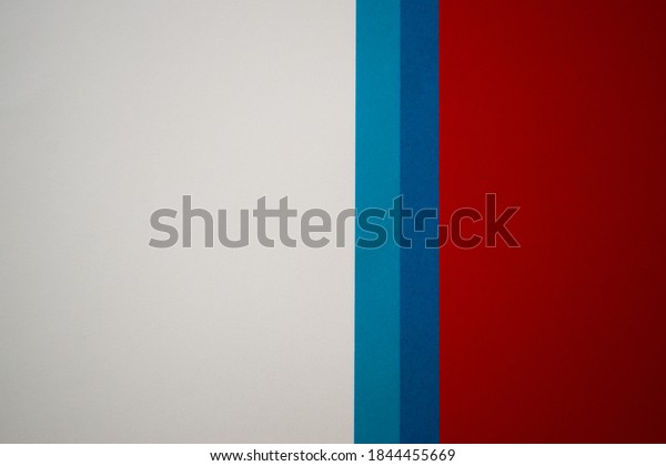 White, blue\
and red vertically divided\
background