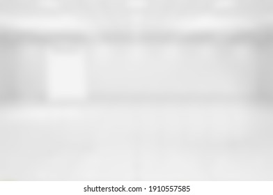 White Blurred Background. Blurry Soft White Warehouse Interior. White And Gray Gradient Abstract Design.