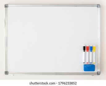 White Board Mockup With Colored Markers. Copy Space For Business Schemes And Charts