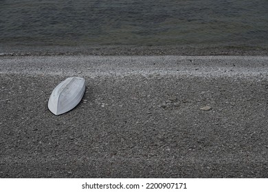 White Boat On Rocky Beach On Gotland