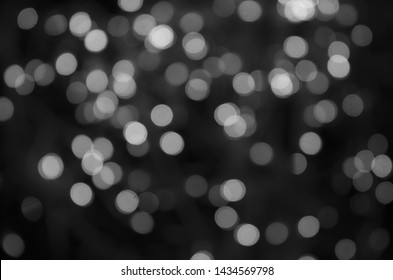 White Bokeh Abstract On Black Background