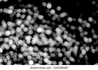 White Bokeh On A Black Background Closeup, Bright Glare Of Light Texture, Light Lights, Black And White Photo