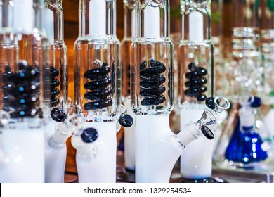 White Bongs With Black Spiral Percolator On Blurred Background