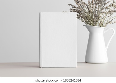 White Book Mockup With A Bouquet Of A Lavender On A Beige Table.