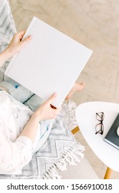 White Book Mockup. Square Empty Book. Album With Clean Pages In Hands Of Woman. Clean Book Cover Mockup