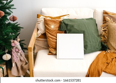 White Book Mockup. Square Empty Book. Album With Clean Pages. White Book Cover Mockup Under The Christmas Tree