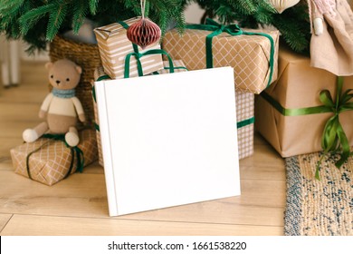 White Book Mockup. Square Empty Book. Album With Clean Pages. White Book Cover Mockup Under The Christmas Tree