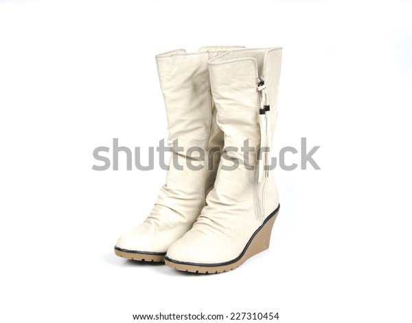 white boots with tassels