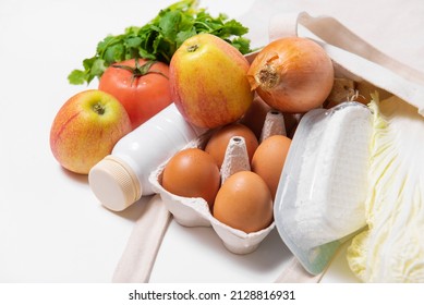 White Bottle, Apples, Onion, Tomato, Chinese Cabbage, Quark, Eggs, Dill In Tote Bag On White Background Spring Fresh Products Vegetables