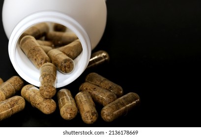 White Bottle With Probiotic Capsules