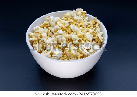 Similar – Striped box with popcorn on yellow background.