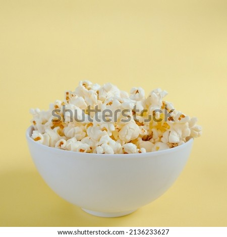 Similar – Striped box with popcorn on yellow background.