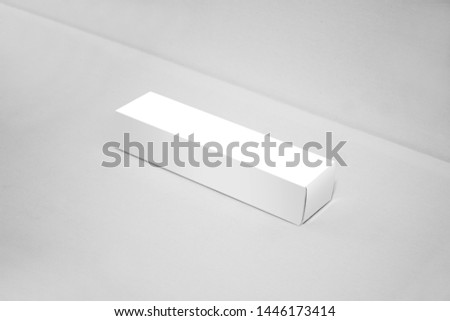 White box mockup on gray space background in isometric view.