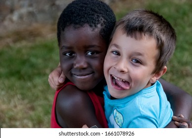 White Boy And Black Boy Hugging