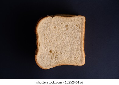white bread with black background