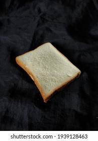 White bread on a black background