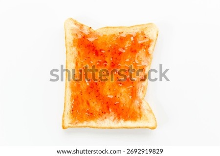 White bread with strawberry jam on a white background
