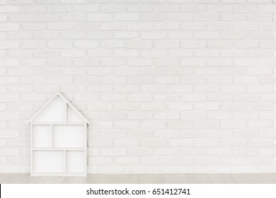 White Brick Wall In Baby Room With White Dollhouse