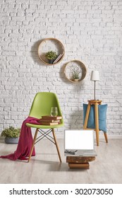 White Brick Wall Interior Style, Laptop, Green Chair 