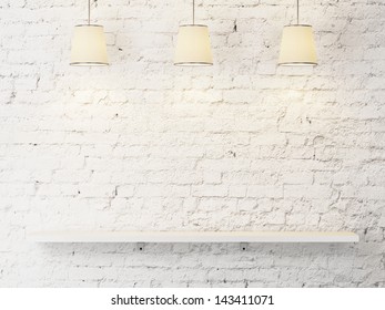 white brick wall with shelf and lamps