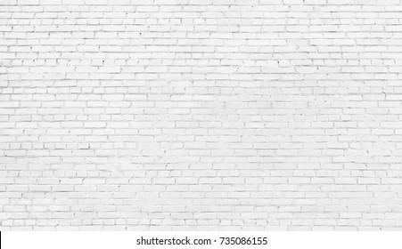 white brick wall, texture of whitened masonry as a background - Shutterstock ID 735086155