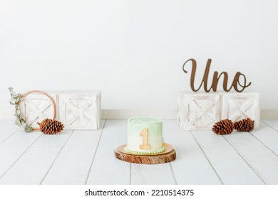 White And Brown Decoration For A 1st Birthday  Studio Photo Session With Wood, Paper Decoration, Cakes And Topper. High Quality Photo