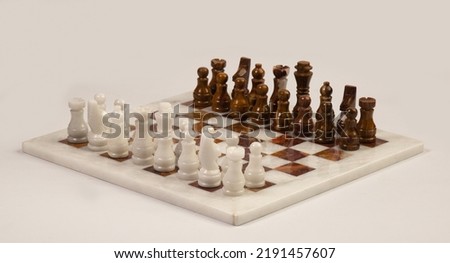 White and brown marble chess board white background