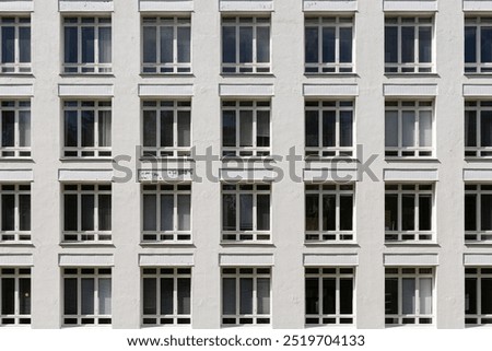 Similar – Image, Stock Photo Residential building facade full frame view.