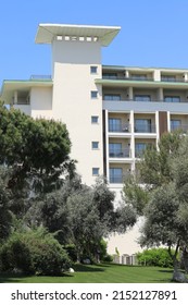 White Building Superstructure And Blue Sky