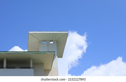 White Building Superstructure And Blue Sky