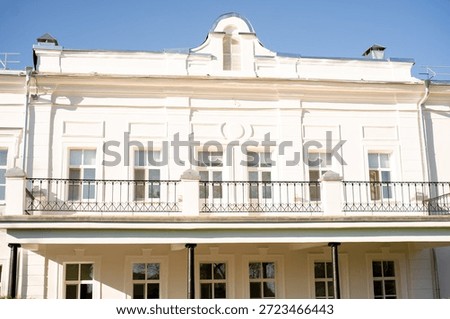 white building windows facade side 