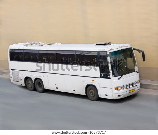 white bus in motion  - See similar\
images of this \