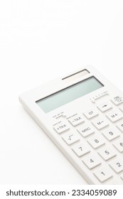 White calculator on white background. - Shutterstock ID 2334059089