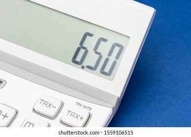 White Calculator screen close-up. Digital numbers.