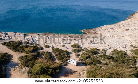White camper, rv, motorhome standing at a beach camp spot, Vis Island, Croatia